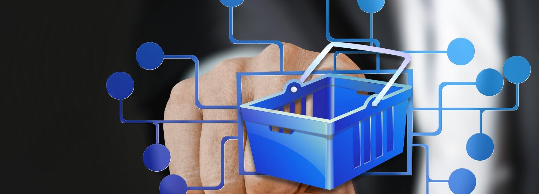 Shopping basket with virtual points; in the background, a hand is pointing at it