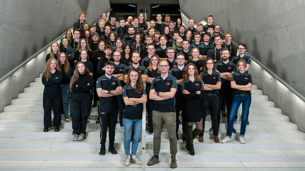 Group photo on a large staircase