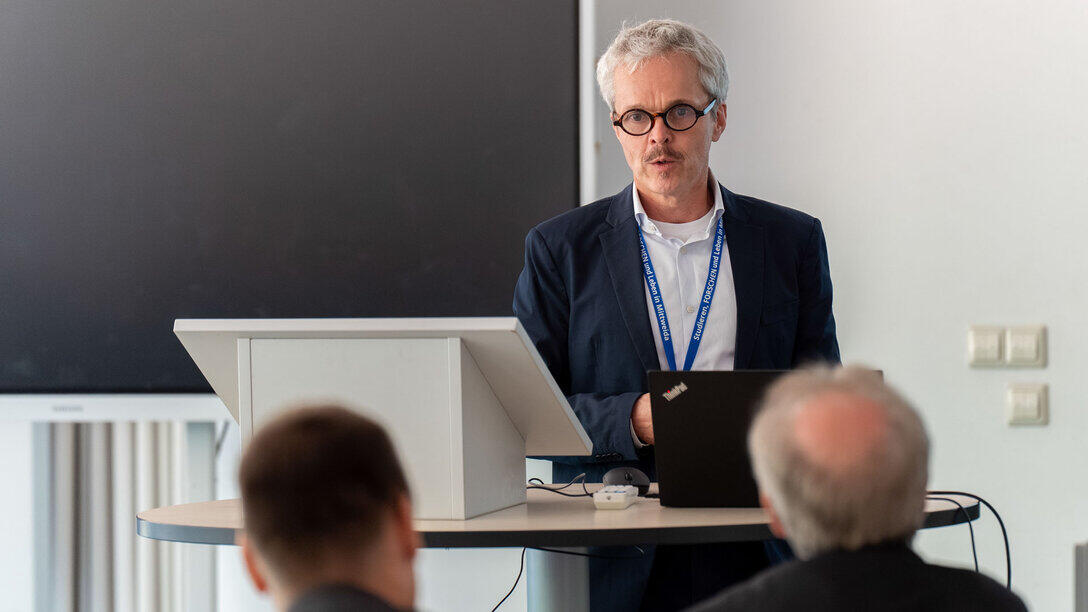 A man at the lectern