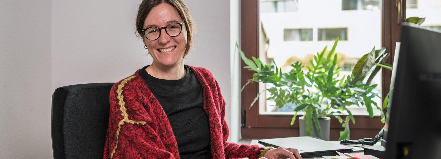 Stefanie Kremmel is sitting at her desk