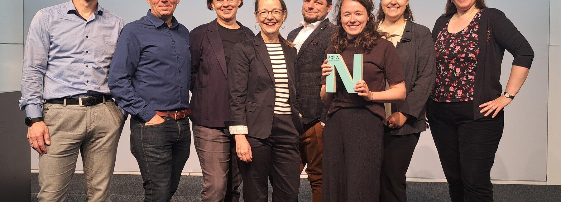 Group photo with eight people