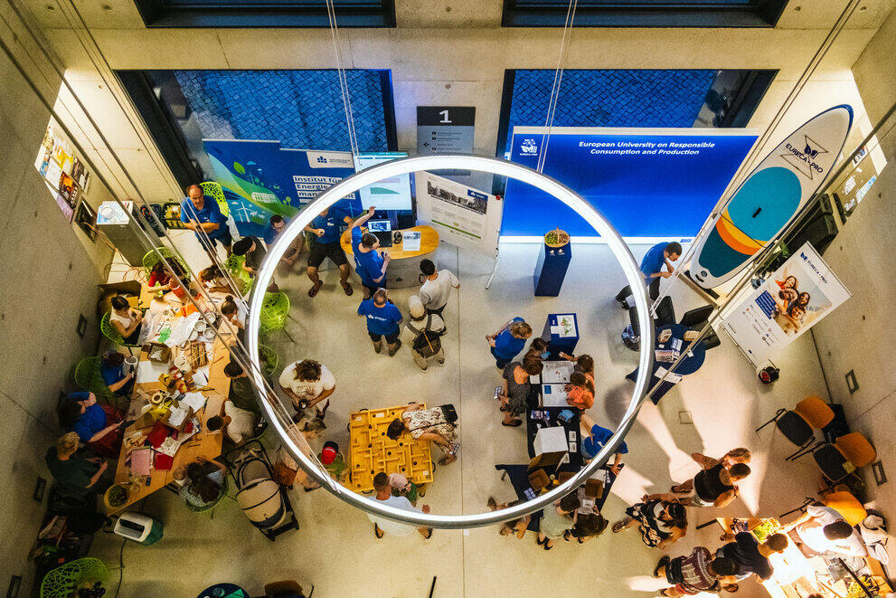 A bird's-eye view photo shows two craft tables with guests.